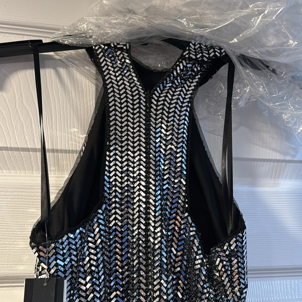 Silver Sequin Gown never worn size 0 purchased at Bloomingdale’s. - Picture 9 of 11